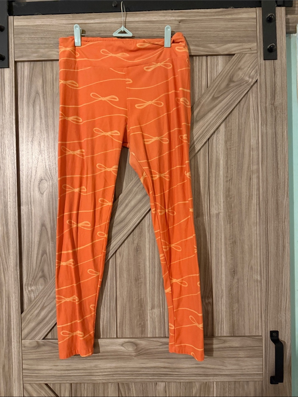 LuLaRoe Orange Bow-Print Leggings